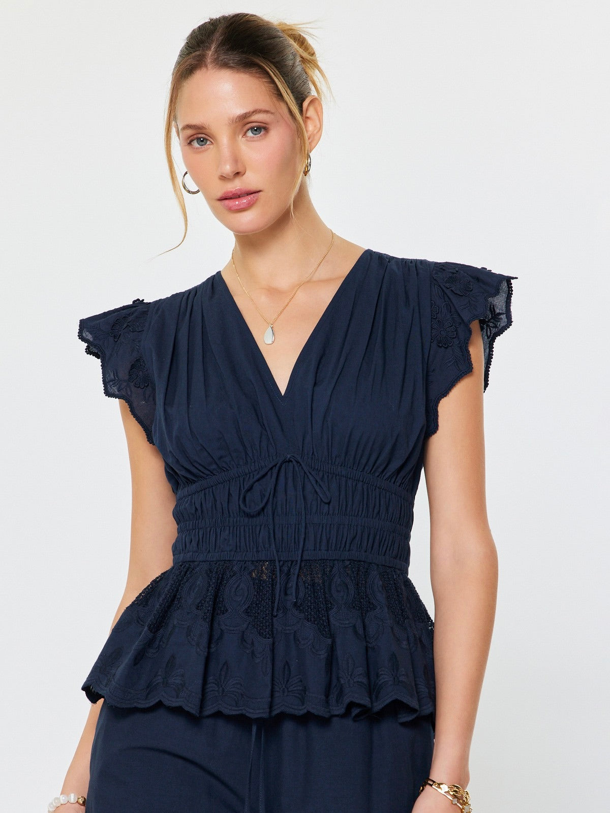 Embroidered Peplum Blouse